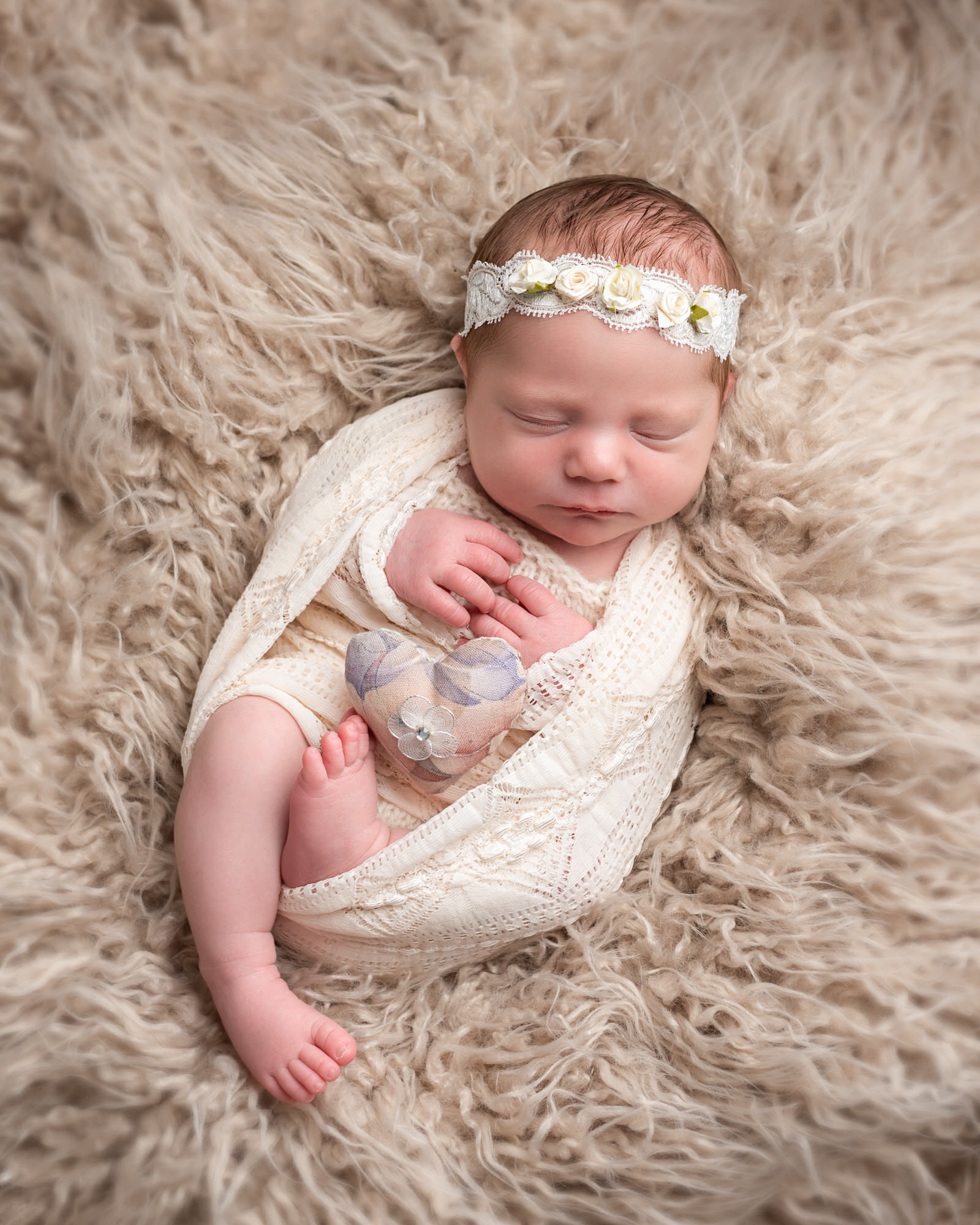 Newborn_baby_photographer_dudley_midlands_posing_on_fur